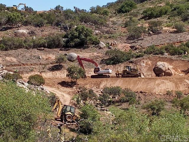 27623 Cougar Pass Road Escondido, CA 92026 - Photo 11 of 12 a view of outdoor space with deck and green space
