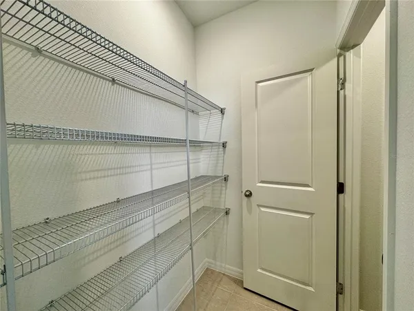 a kitchen with stainless steel appliances granite countertop lots of counter top space