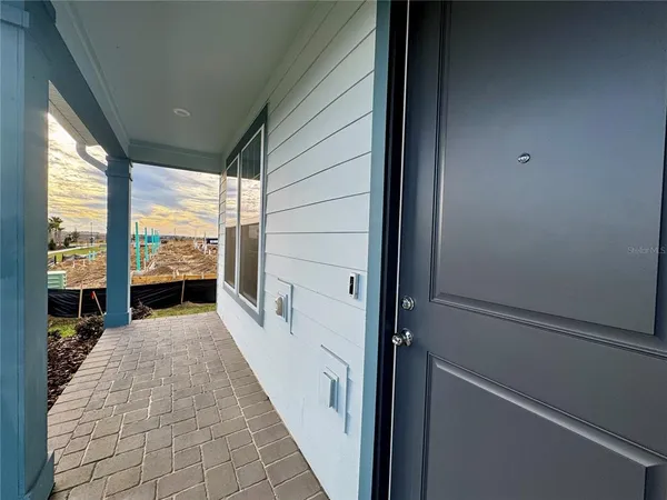 a hallway with sliding door and mountain view