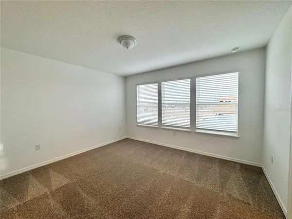 a view of hallway with stairs