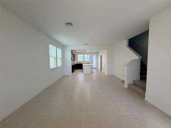 a view of livingroom with furniture and window