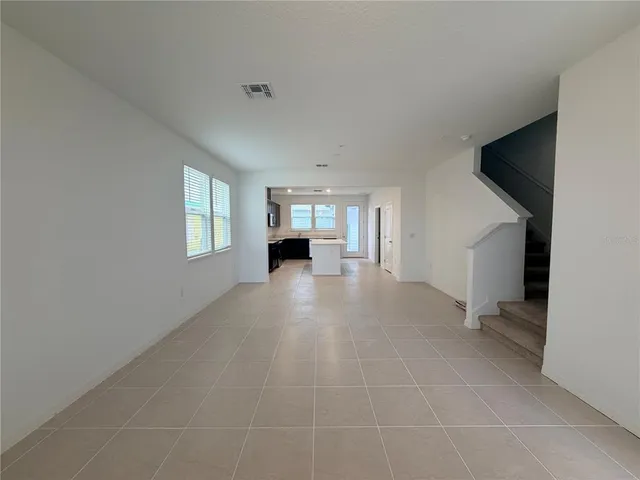 a view of livingroom with furniture and window
