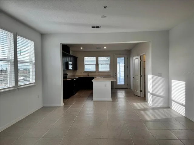 a view of swimming pool is middle and garden