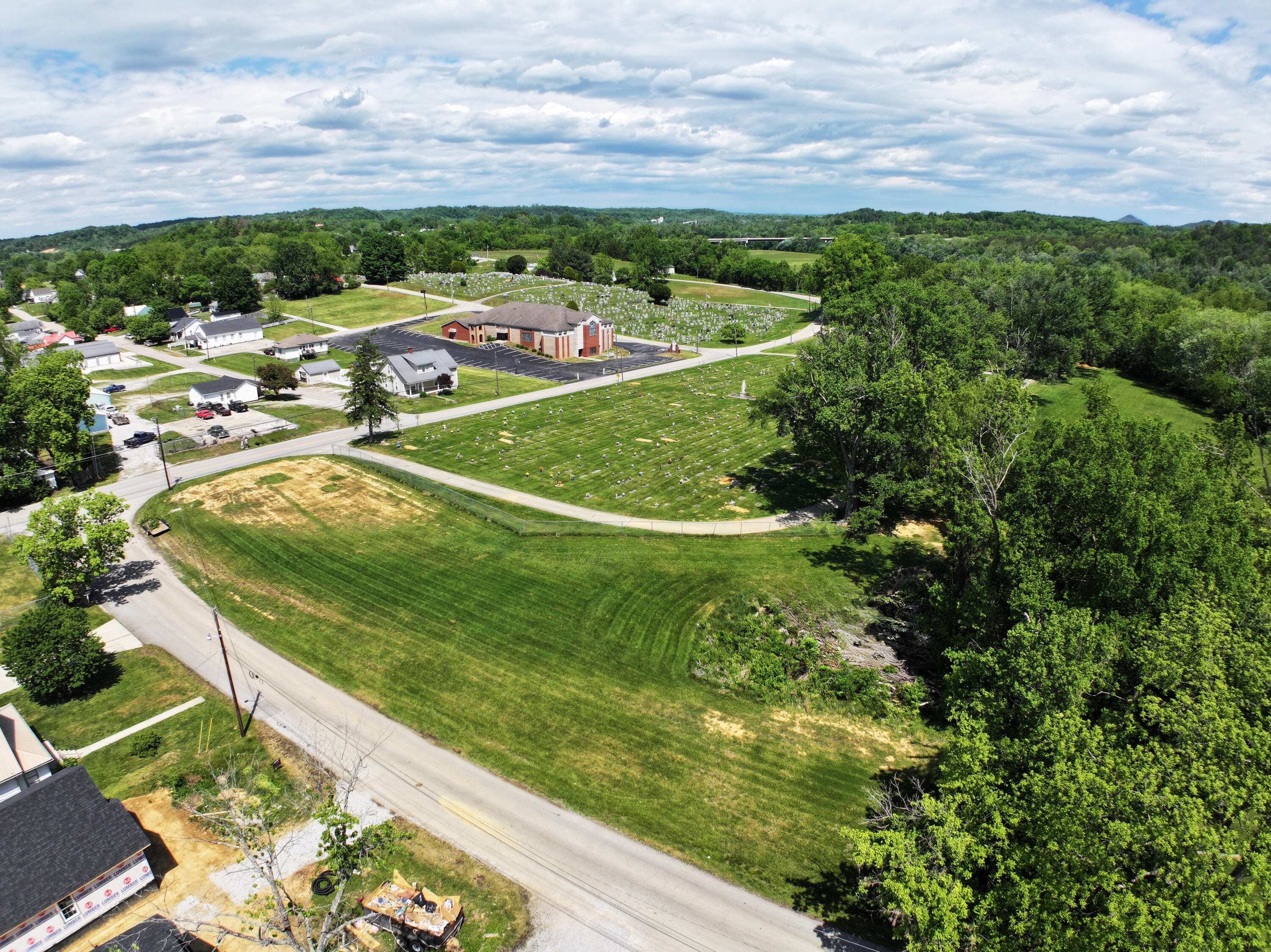 Prime opportunity with high visibility and endless potential. This gently rolling tract offers excellent road frontage and multiple ideal building sites for residential or commercial use. Located just outside city limits, you get the convenience of nearby amenities without the added city taxes!