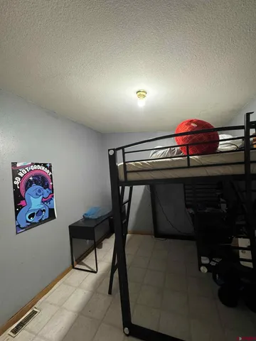 a view of a workspace with furniture