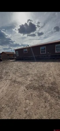 a bathroom with a toilet a sink and bathtub