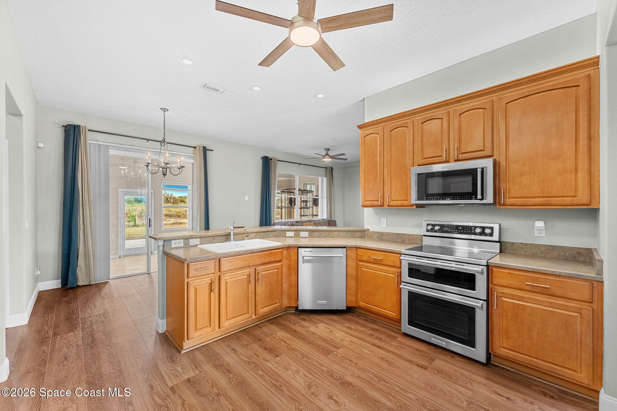 1305 Pemberton Trail Malabar, FL 32950 - Photo 13 of 75 Kitchen/Open Space