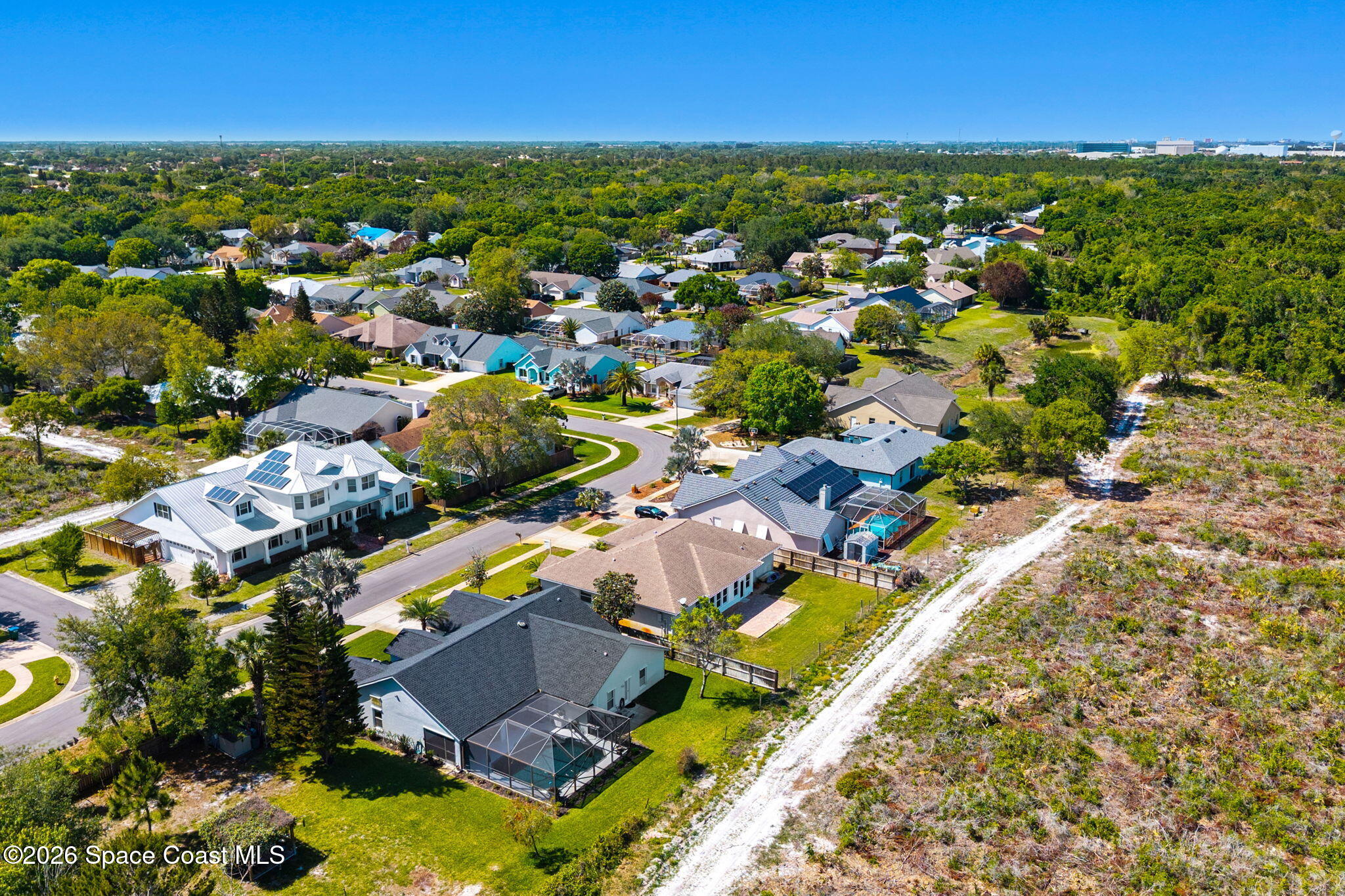 1305 Pemberton Trail Malabar, FL 32950 - Photo 54 of 69 an aerial view of residential houses with outdoor space and swimming pool