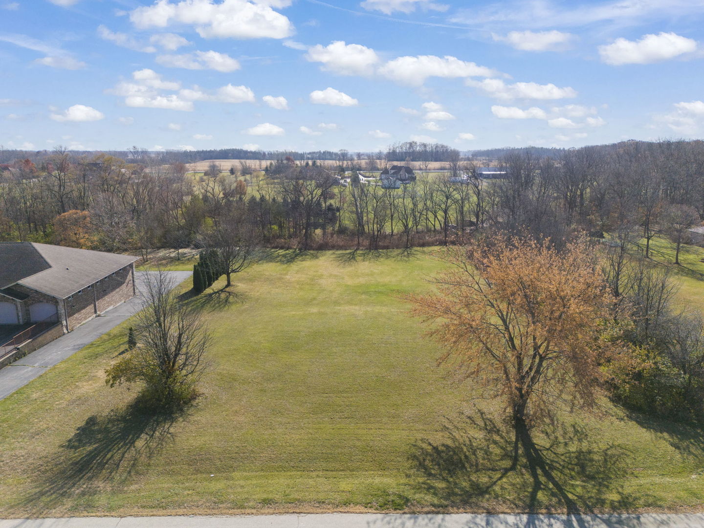 5147 West Jason Drive Monee, IL 60449 - Photo 6 of 15 a view of a lake with a yard