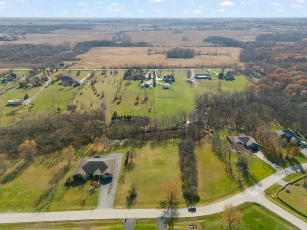 a view of swimming pool with a yard