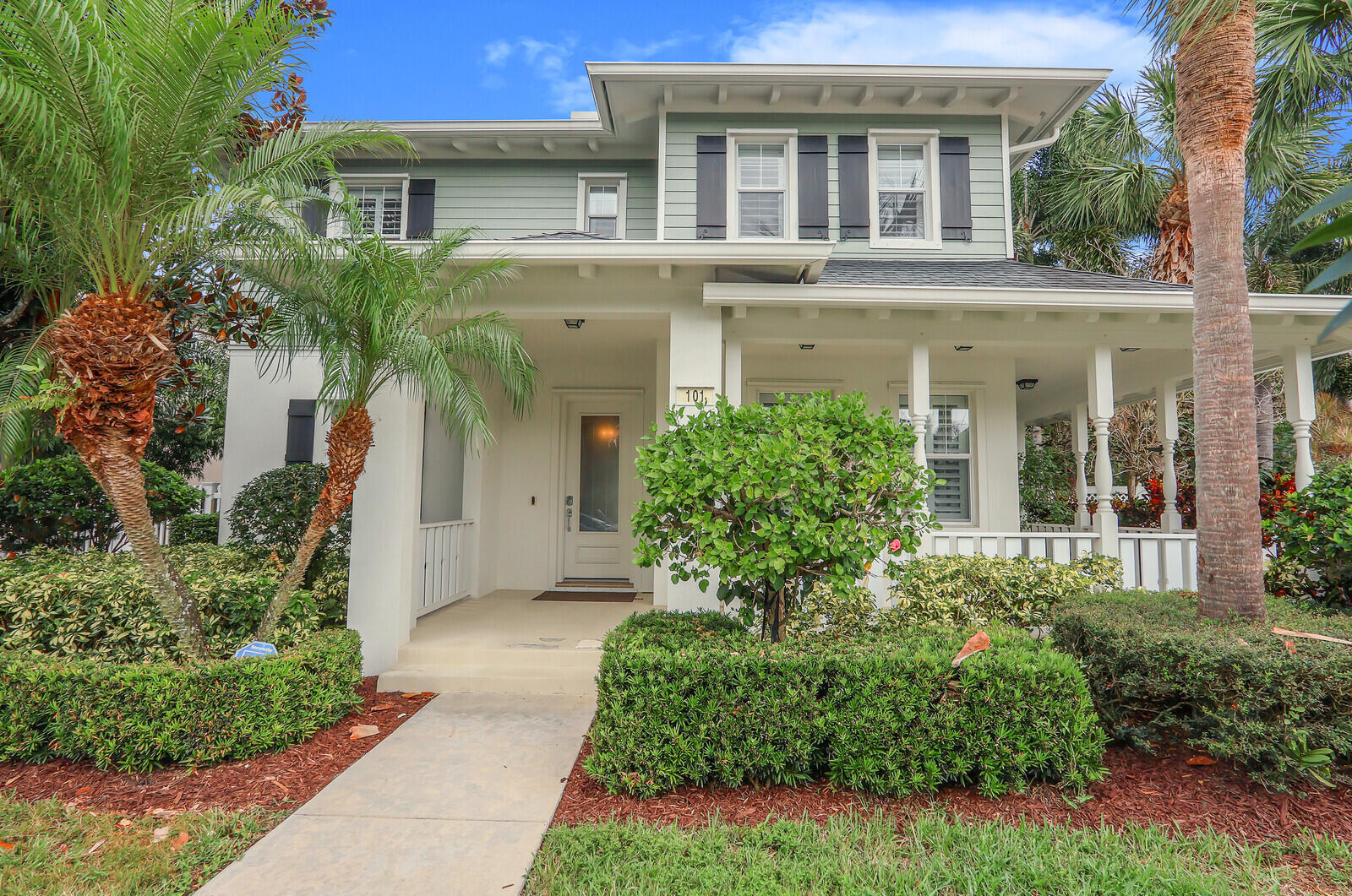 101 St Pierre Way Jupiter, FL 33458 - Photo 3 of 57 a front view of a house with garden