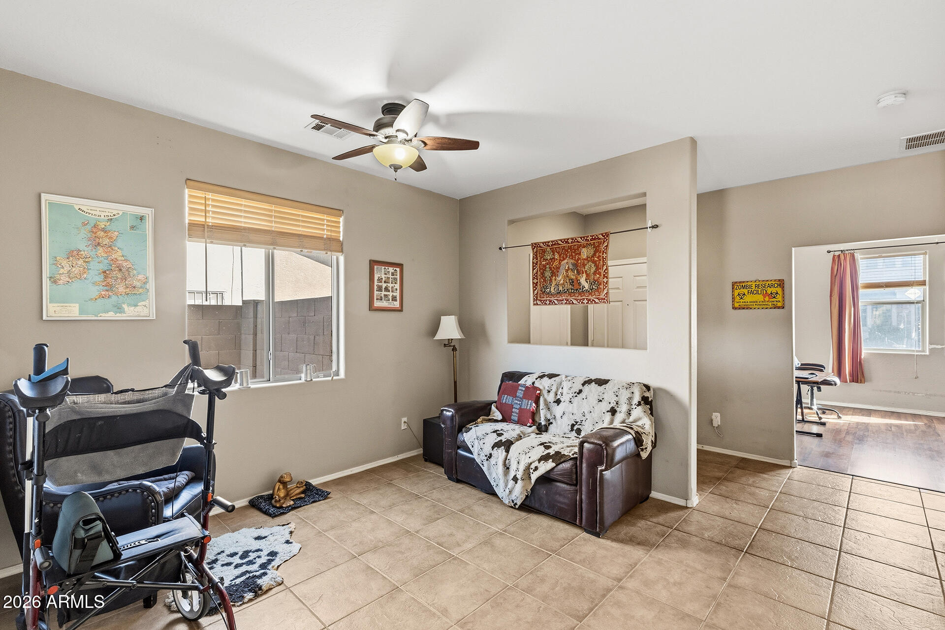 6718 West Darrel Road Laveen, AZ 85339 - Photo 29 of 49 a bedroom with furniture and a window