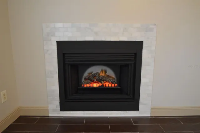 a living room with a fireplace