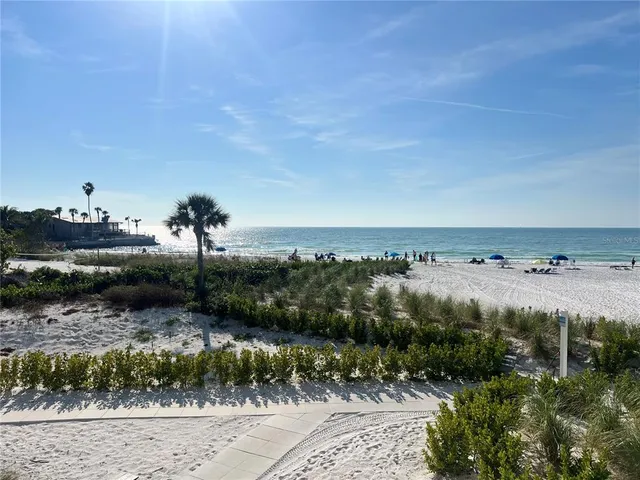 a view of a water and yard
