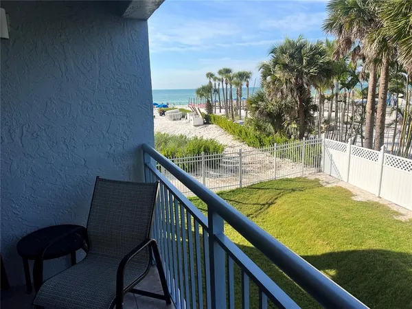 a view of swimming pool from a balcony