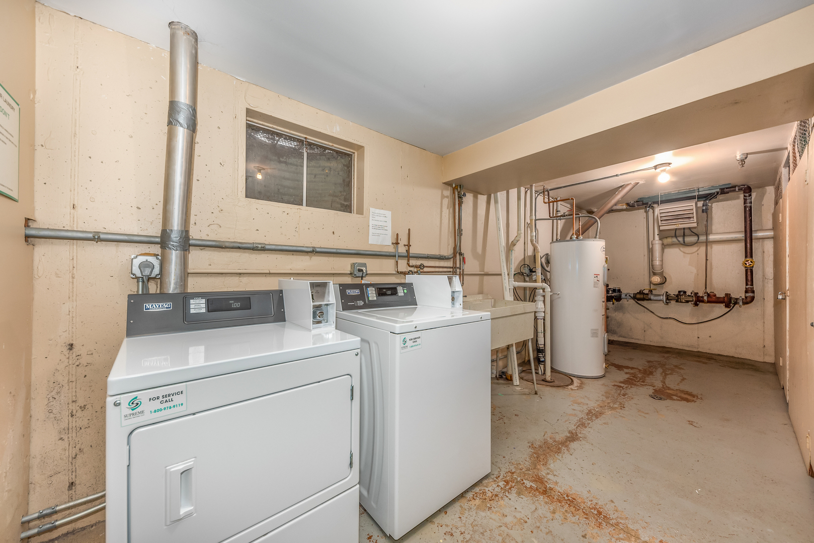 404 East Kensington Road, Unit C Mount Prospect, IL 60056 - Photo 15 of 16 a view of a storage & utility room with washer and dryer