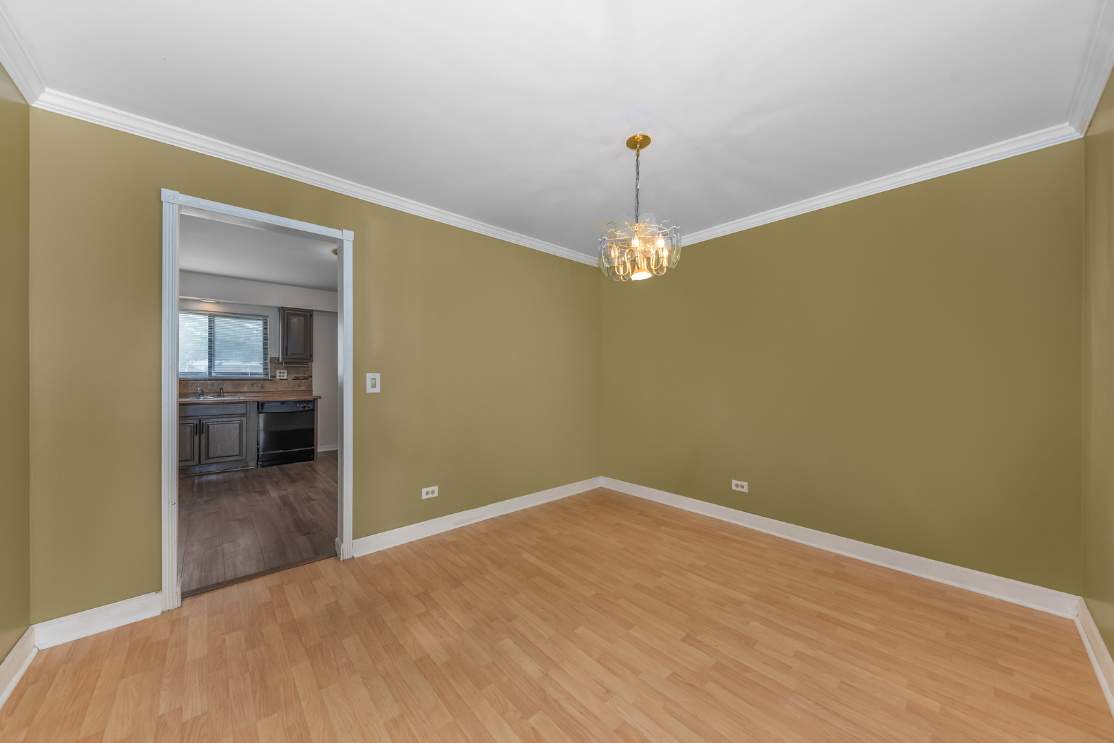 404 East Kensington Road, Unit C Mount Prospect, IL 60056 - Photo 5 of 16 a view of a room with wooden floor
