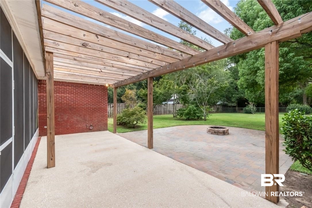 8837 Dawes Lake Road South Mobile, AL 36619 - Photo 35 of 44 View of patio / terrace featuring a fire pit and a pergola