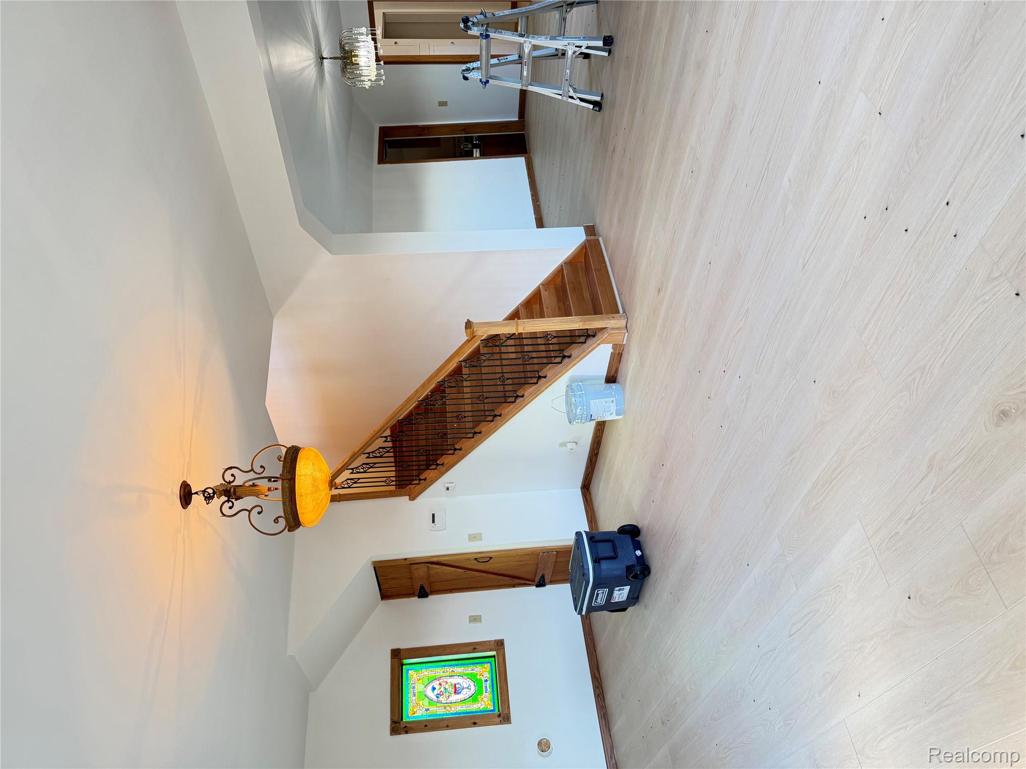 2455 Jacob Road Caro, MI 48723 - Photo 3 of 28 Unfurnished living room with hanging lights and light wood-style flooring