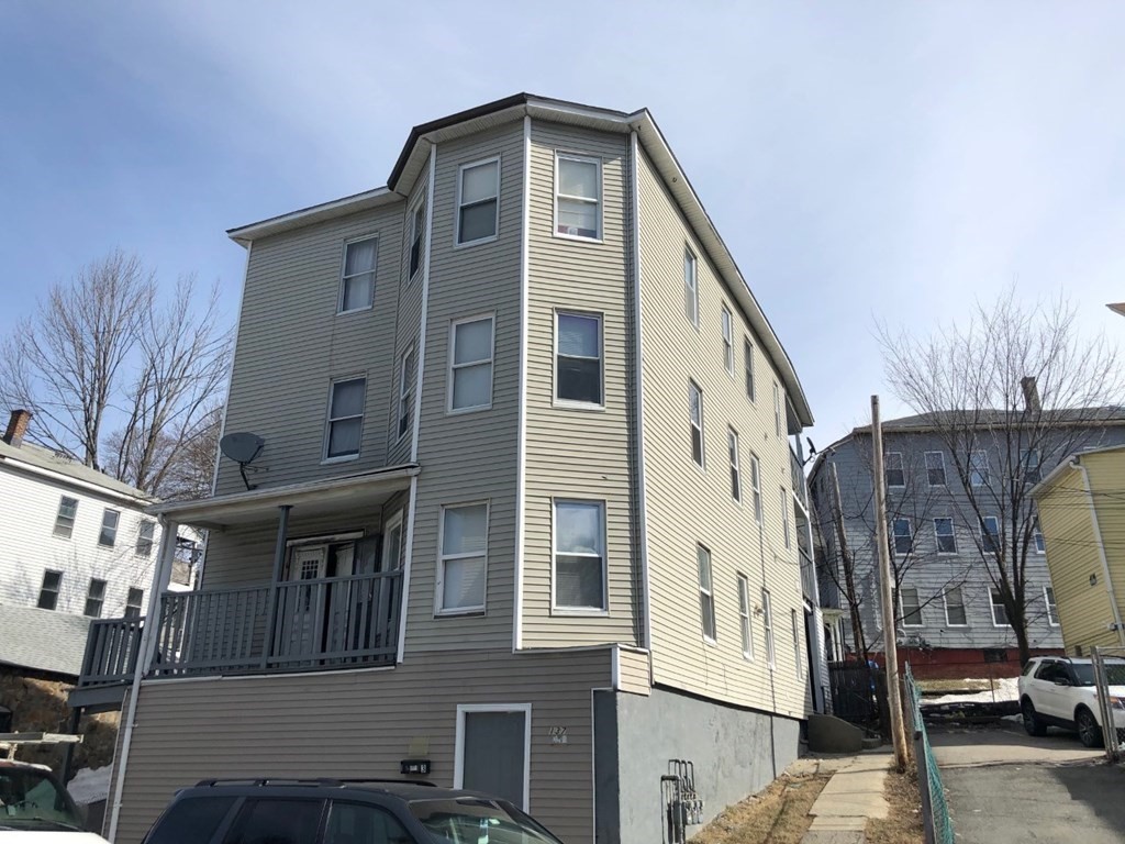137 Eastern Worcester, MA 01605 - Photo 3 of 15 a front view of a house with parking