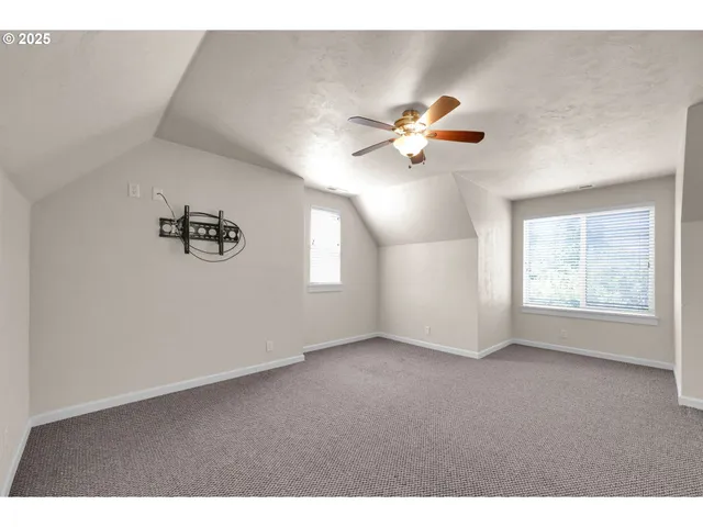 a view of empty room with windows