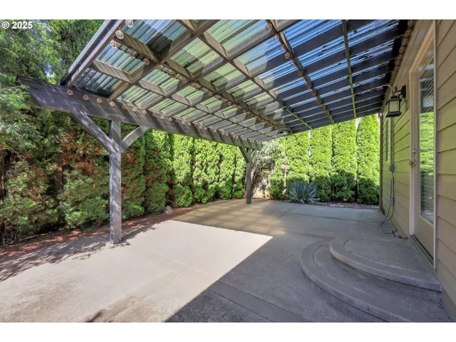 a backyard of a house with lots of green space