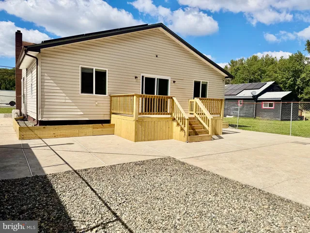 a view of a house with a swimming pool