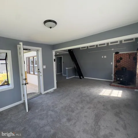 an empty room with windows