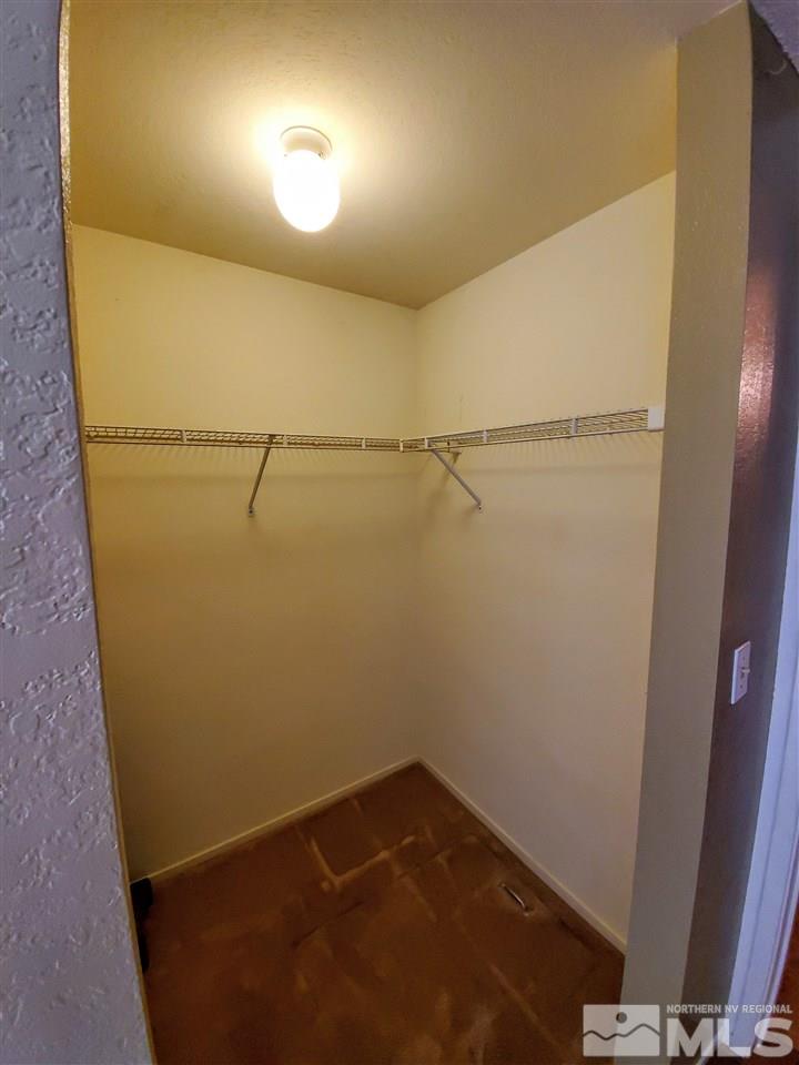 216 Ring Road Dayton, NV 89403 - Photo 11 of 14 a view of a room with racks on the wall