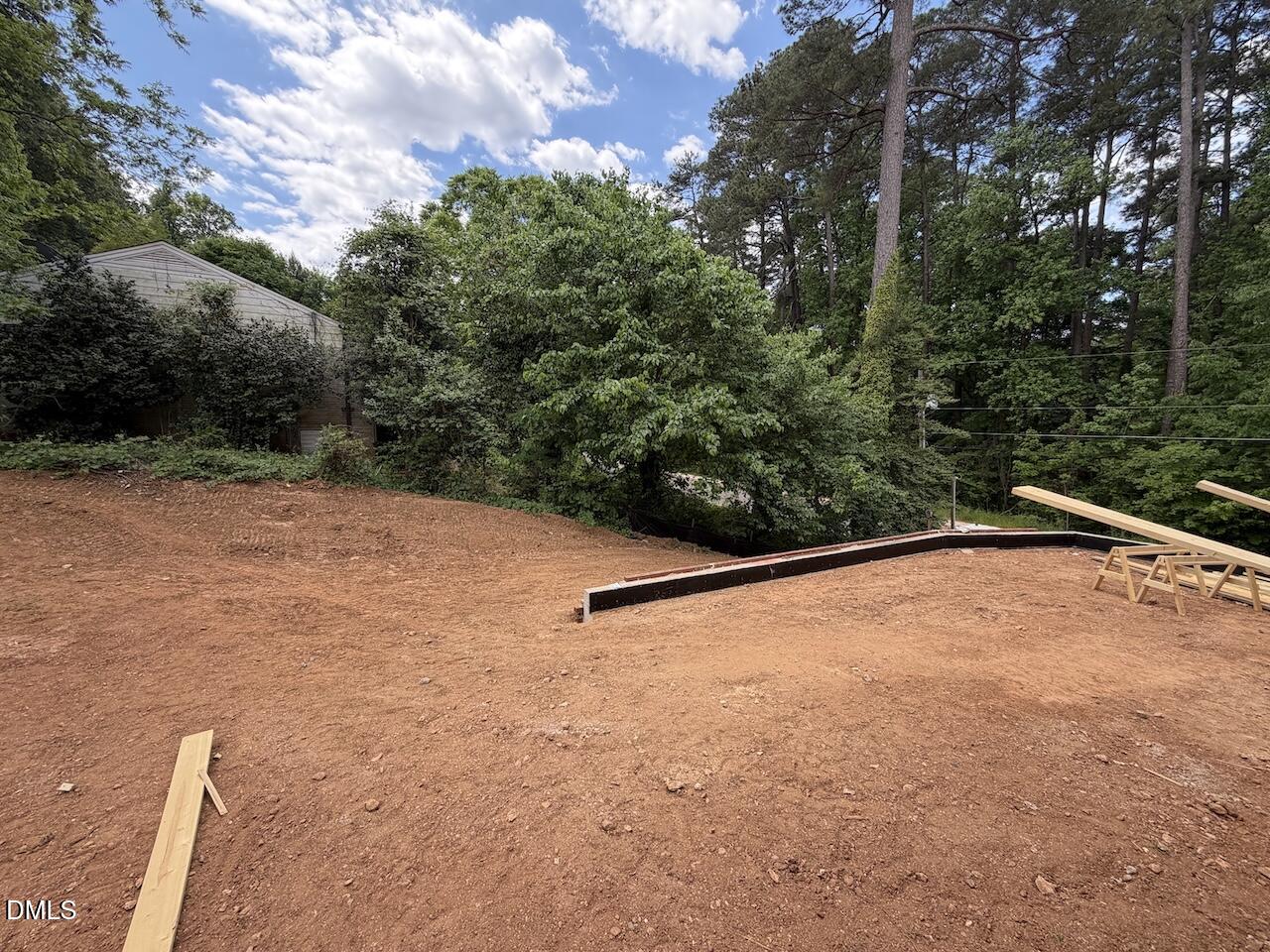 2123 Dunhill Drive Raleigh, NC 27608 - Photo 10 of 10 a backyard of a house with lots of green space