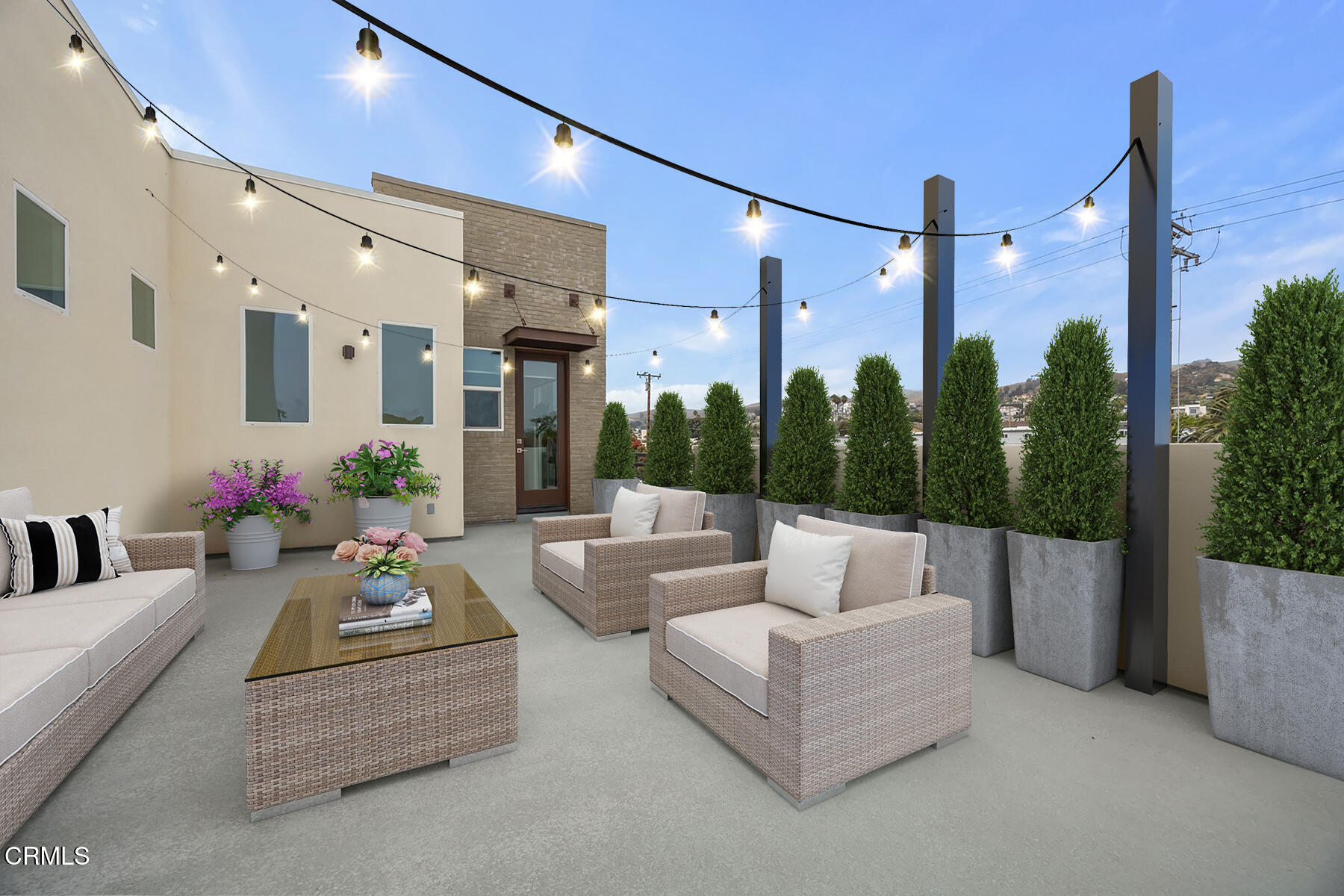 1290 East Thompson Boulevard, Unit 102 Ventura, CA 93001 - Photo 1 of 26 a living room with furniture and a large window