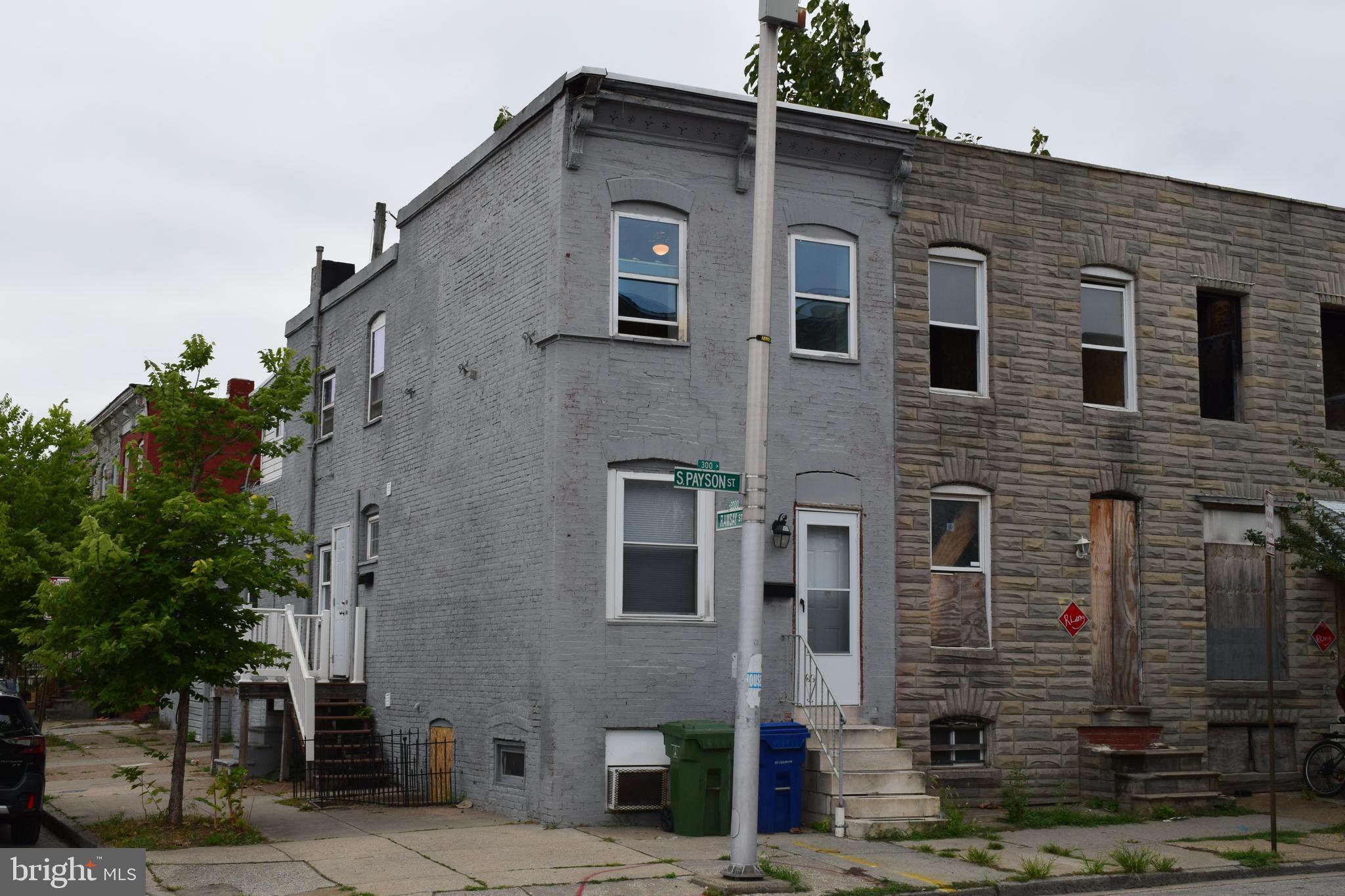 a front view of a house with glass windows