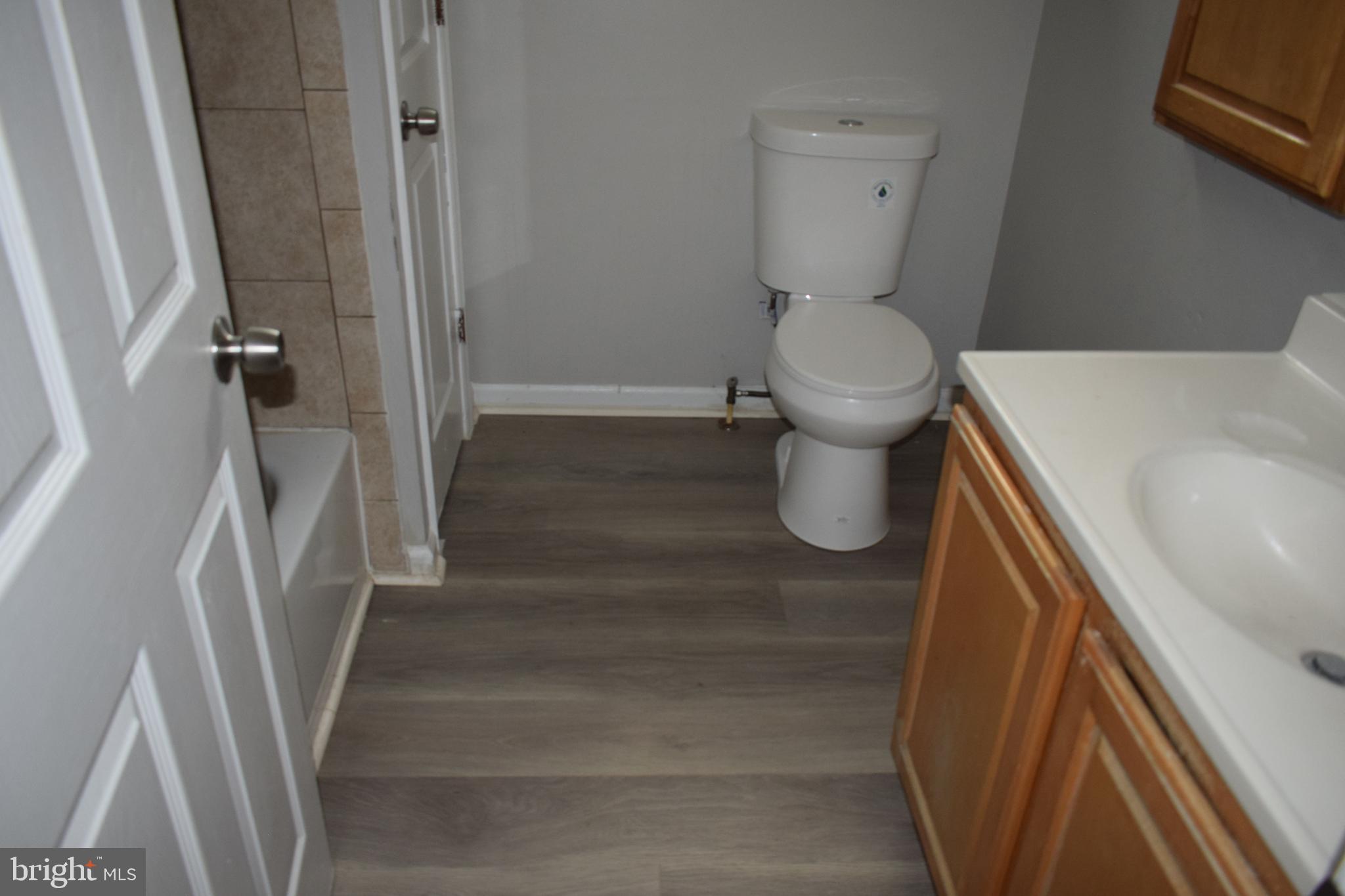 346 South Payson Street Baltimore, MD 21223 - Photo 24 of 29 a bathroom with a sink and toilet