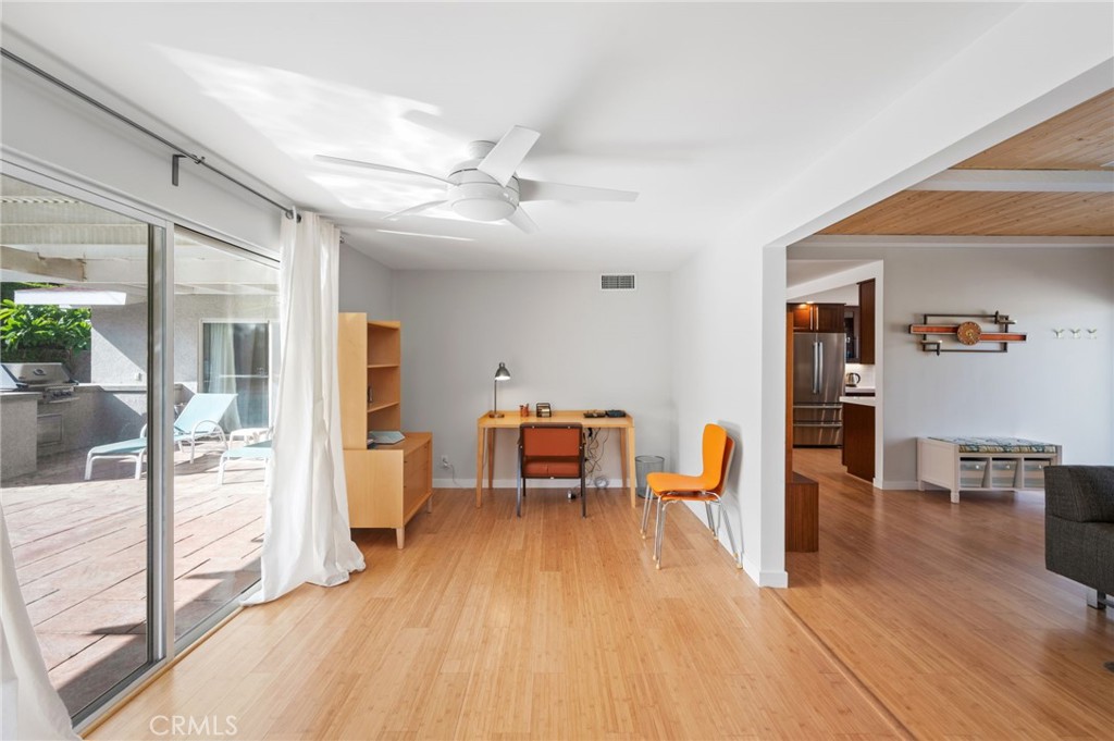 72543 Beavertail Street Palm Desert, CA 92260 - Photo 12 of 45 a living room with furniture and a wooden floor