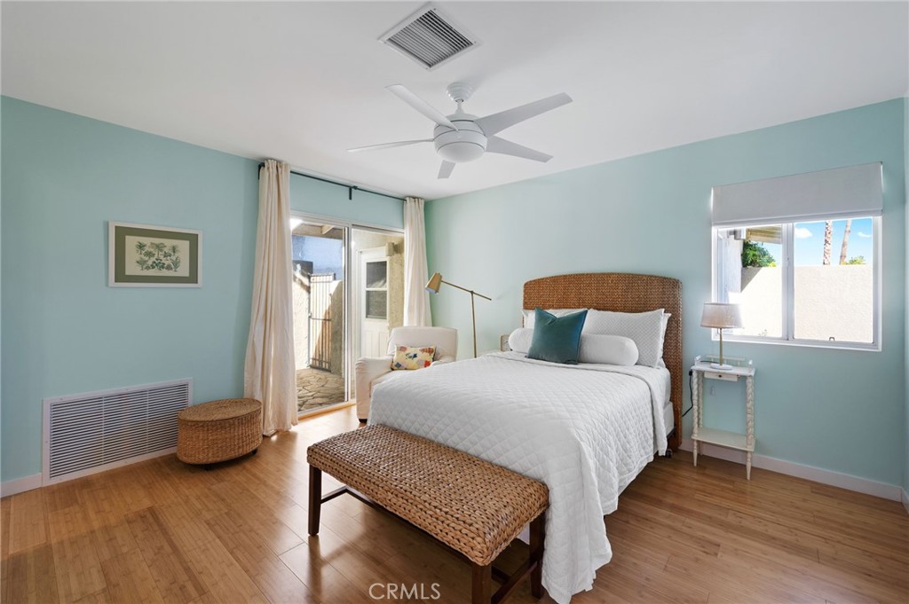 72543 Beavertail Street Palm Desert, CA 92260 - Photo 20 of 45 a bedroom with a bed and a window