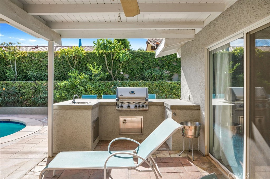 72543 Beavertail Street Palm Desert, CA 92260 - Photo 35 of 45 a work place sitting area with furniture and garden view