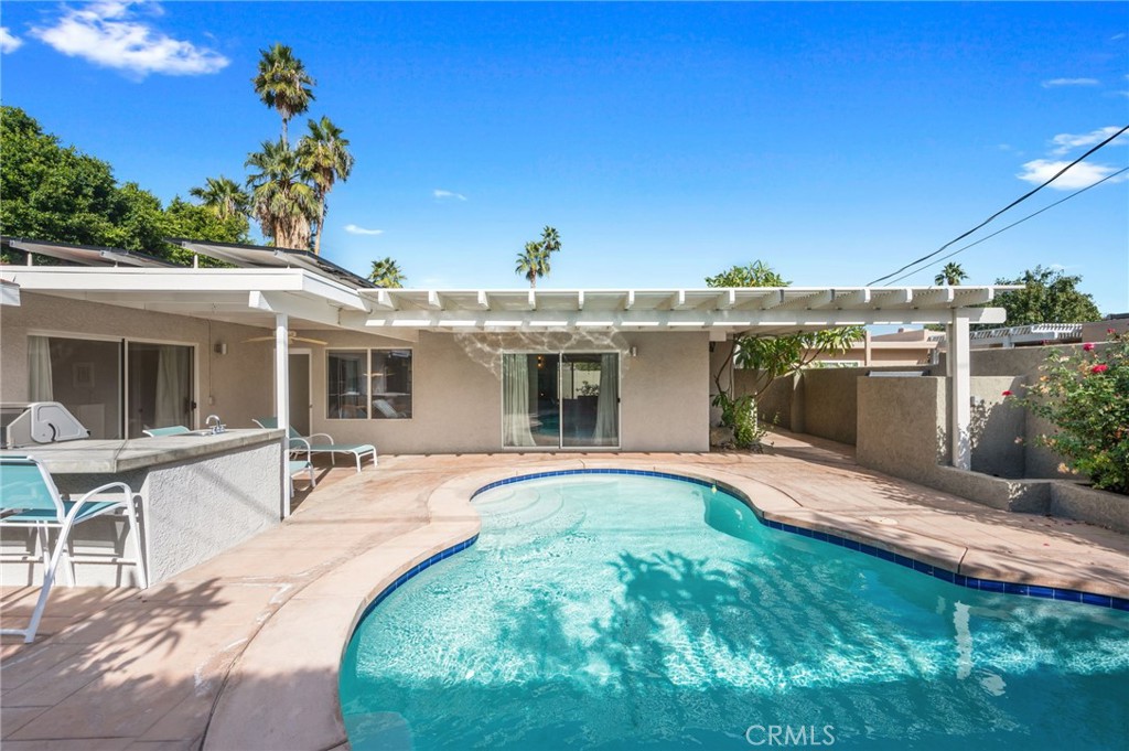72543 Beavertail Street Palm Desert, CA 92260 - Photo 38 of 45 a view of a house with a backyard