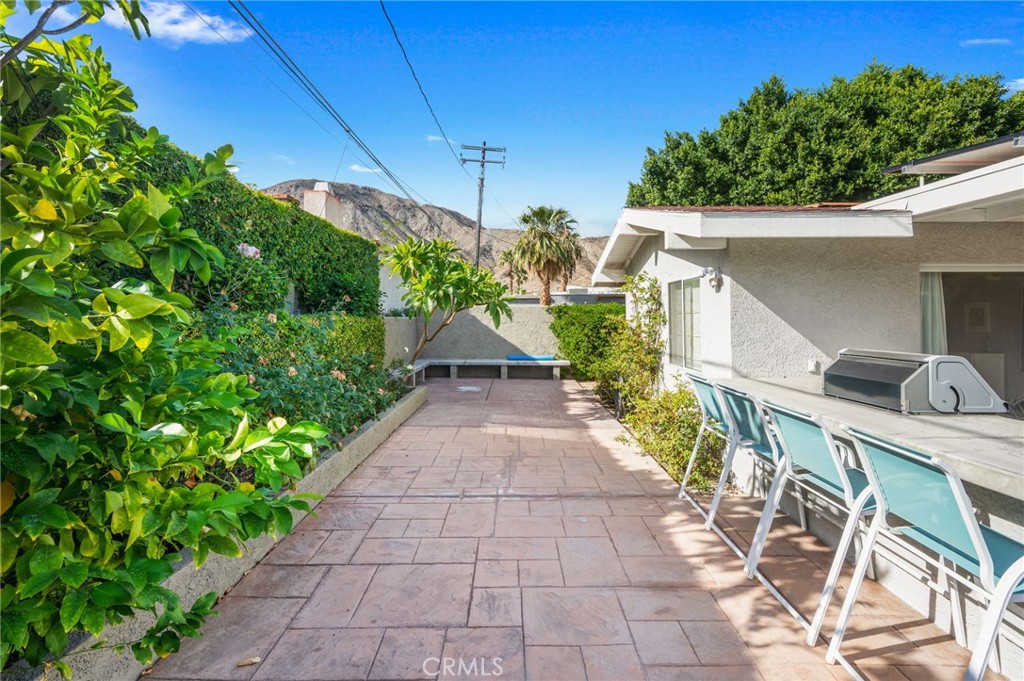 72543 Beavertail Street Palm Desert, CA 92260 - Photo 39 of 45 a view of a pathway with a patio