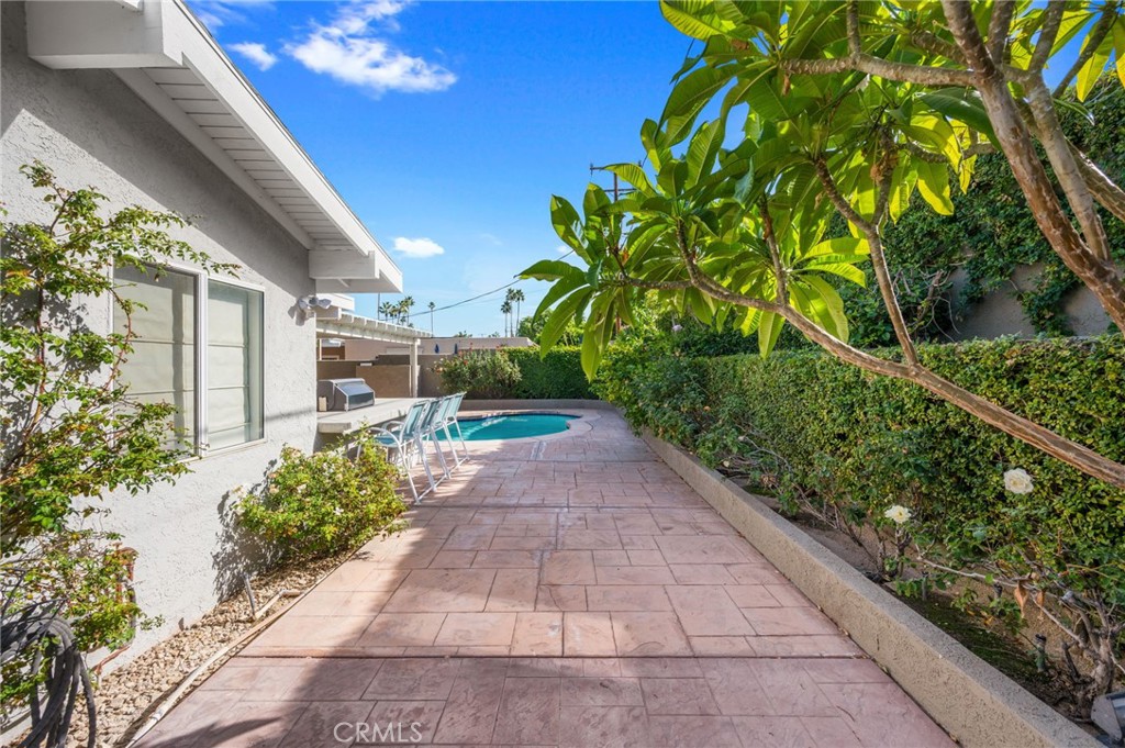 72543 Beavertail Street Palm Desert, CA 92260 - Photo 41 of 45 a view of a pathway with a yard
