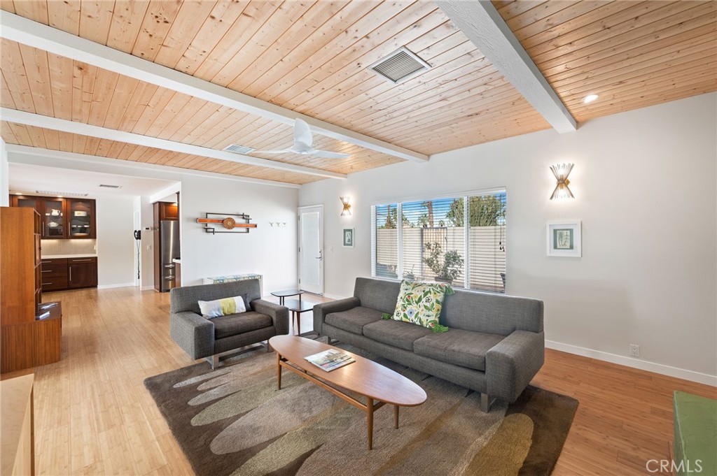 72543 Beavertail Street Palm Desert, CA 92260 - Photo 10 of 45 a living room with furniture and wooden floor
