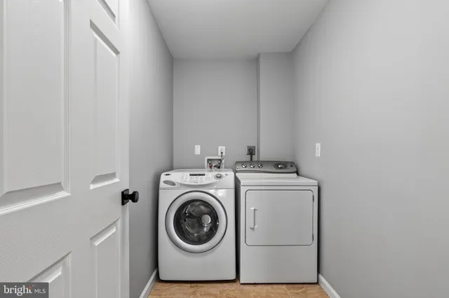 a kitchen that has a sink and a stove