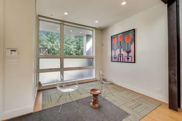 a room with furniture and a window