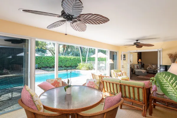 a kitchen with stainless steel appliances granite countertop a sink a stove and a microwave oven