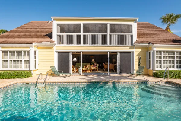 a bathroom with a granite countertop sink shower and a mirror