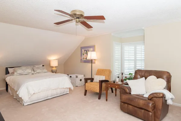 a aerial view of a house with a yard