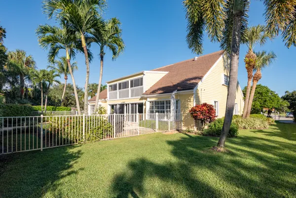 a dining room with furniture wooden floor and a table