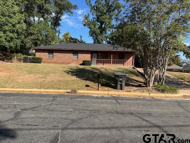 2100 Faulkner Street Tyler, TX 75701 - Photo 2 of 9 a view of a house with a yard