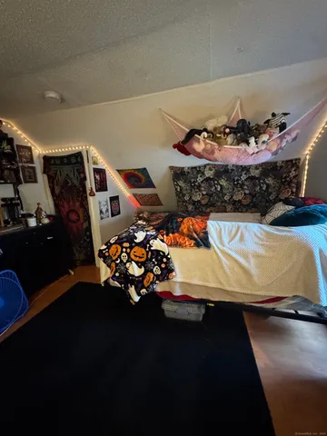 a kitchen with stainless steel appliances a stove a sink and a refrigerator