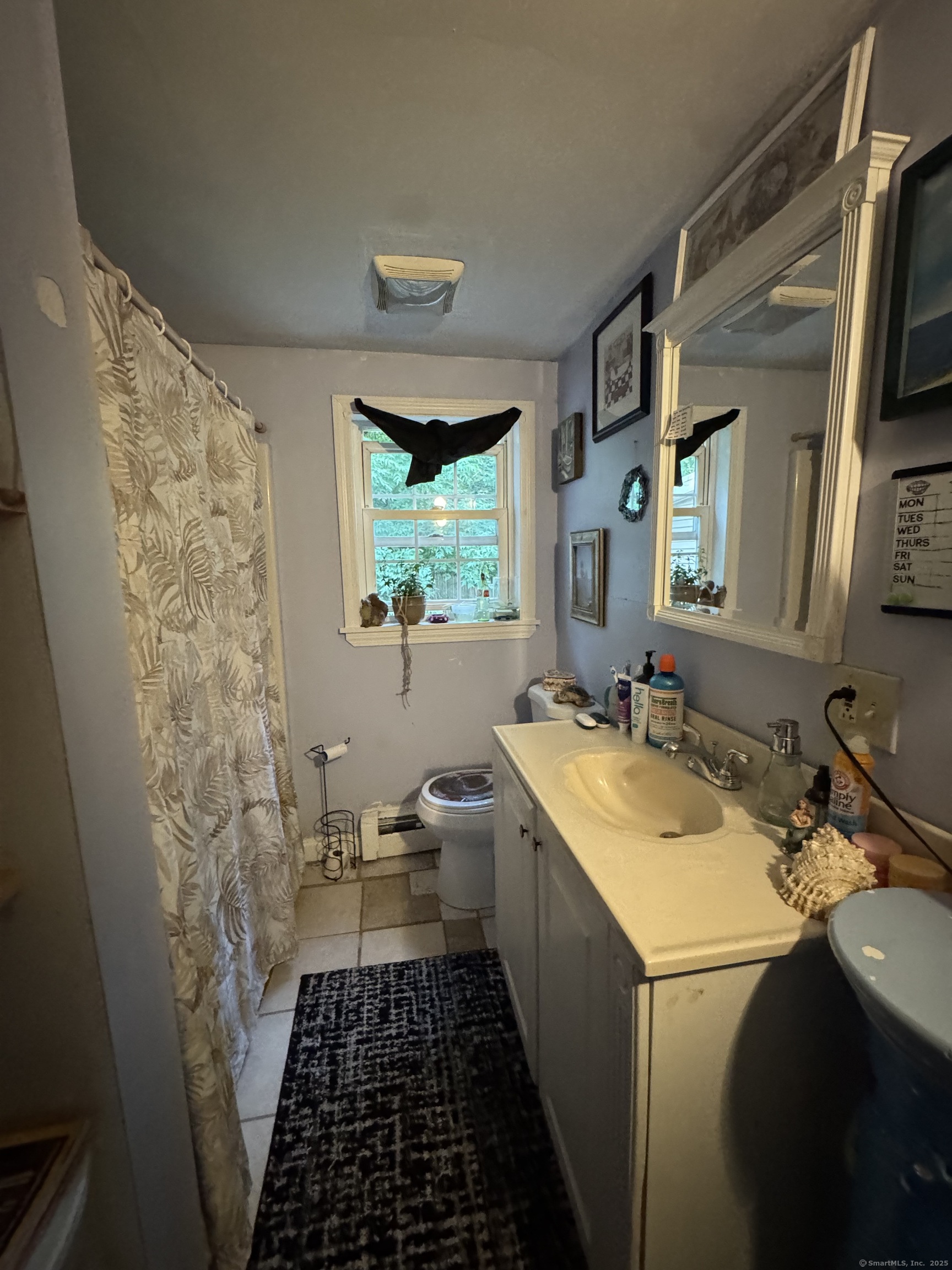 445 East Main Street Norwich, CT 06360 - Photo 6 of 6 a bathroom with a sink and a mirror