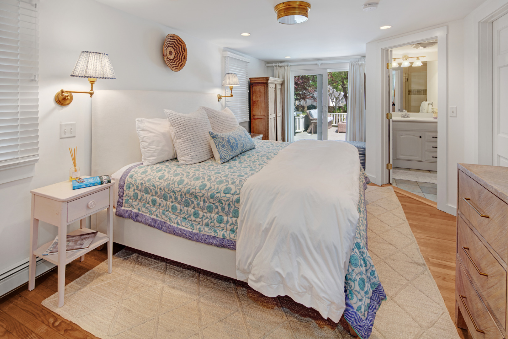 5 Hillman Drive Edgartown, MA 02539 - Photo 16 of 34 a bed room with a bed and a mirror